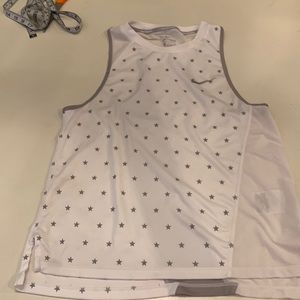 Nike DRI-FIT razerback tank. With stars on the front

P